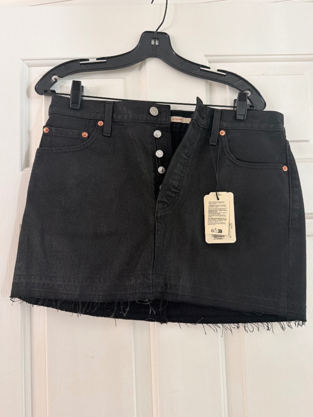 Denim coated Levi’s mini skirt